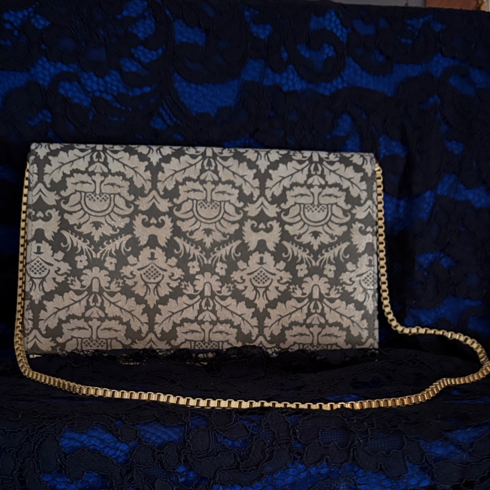 Elegant Patterned Clutch with Gold Chain